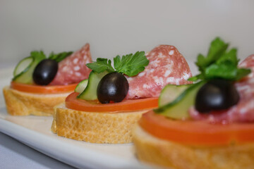 Vegetable dishes with meat, fish and eggs. Snacks, canapes. A variety of snacks. It's time to eat healthy food. Meals by the hour. The concept of a healthy lifestyle.