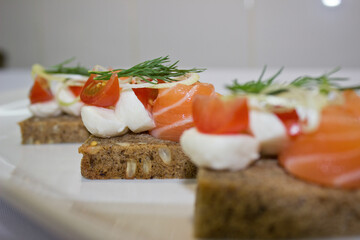 Vegetable dishes with meat, fish and eggs. Snacks, canapes. A variety of snacks. It's time to eat healthy food. Meals by the hour. The concept of a healthy lifestyle.