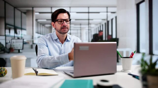 Upset Worried Man Using Laptop