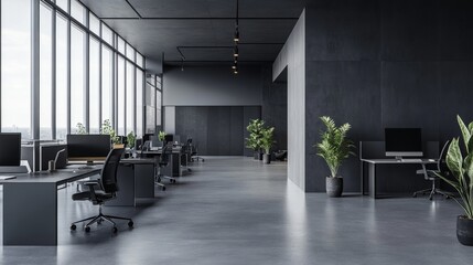 Modern, minimalist office space with large windows, grey walls, and sleek workstations.