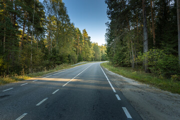 A road with a forest in the background