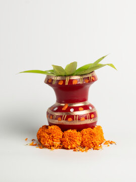 Alpona desing Terracotta  ghot with green coconut and mango branch