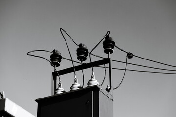 Black and white image of power lines.