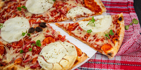Pizza goat cheese, tomato sauce, bacon tasty food dish fresh delicious gourmet food background on...