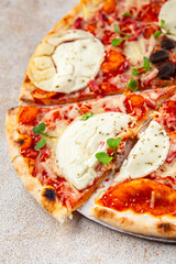 Pizza goat cheese, tomato sauce, bacon tasty food dish fresh delicious gourmet food background on the table rustic food top view copy space top view