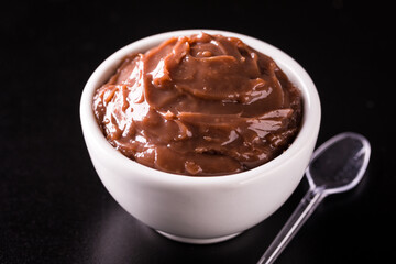 Delicious Creamy Chocolate Pudding in White Ceramic Bowl