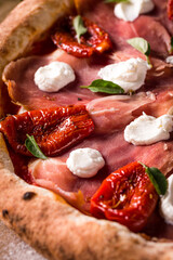 Delicious Italian Pizza with Prosciutto and Sun-Dried Tomatoes