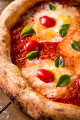 Delicious Italian Margherita Pizza With Fresh Basil and Cherry Tomatoes