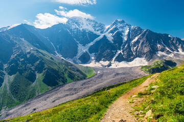 Picturesque view of the glacier seven with a tourist trail in sunny weather