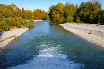View of the Isar from the Flauchersteg, Munich, Germany. The renaturation of the alpine river leads...