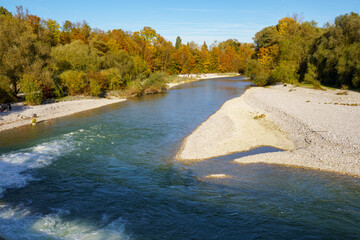 View of the Isar from the Flauchersteg, Munich, Germany. The renaturation of the alpine river leads...