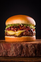 Delicious Gourmet Burger with Melted Cheese and Bacon