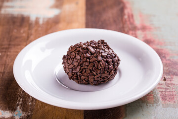 Delicious Chocolate Brigadeiro on a White Plate Close-Up