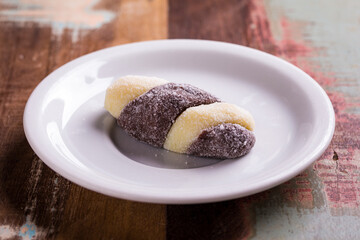 Delicious Chocolate and Coconut Pastry on a White Plate