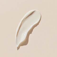Beige cream swatch on a light background. Hydrating moisturizer or nourishing skincare lotion texture.