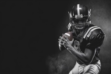 Obraz premium American Football Player Ready for the Play: A powerful image of a determined American football player in full gear, ready to make a play. The player is poised, focused.