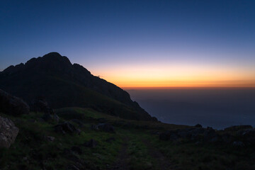 Fototapeta premium Red sunset seen from the mountains