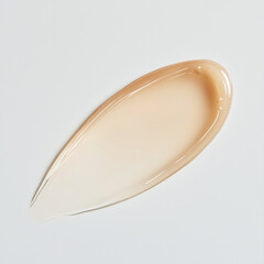 Beige translucent serum swatch on a white background. Hydrating shower gel or shampoo texture.