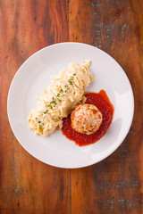 Delicious Italian Pasta and Meatball Dish on Wooden Table