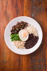 Traditional Brazilian Dish with Rice, Beans, and Steak