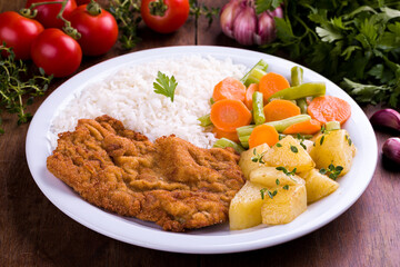 Delicious Homemade Meal with Fried Steak and Vegetables
