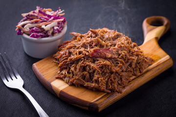 Delicious Pulled Pork with Coleslaw on Wooden Serving Board