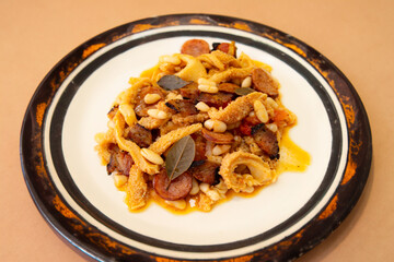Beef tripe (bucho), beef stomach, tripe on a white plate. Dobradinha