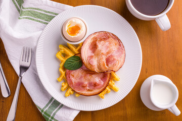 Delicious Breakfast Plate With Bacon, Waffles, And Egg