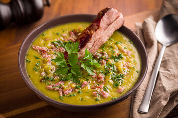 Delicious Hearty Soup with Smoked Rib and Fresh Parsley Garnish