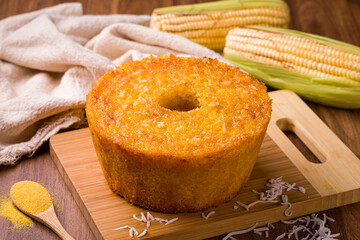 Delicious Corn Cake With Coconut on Wooden Cutting Board