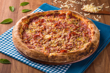 Delicious Pepperoni Pizza on Wooden Table with Cheese Shavings