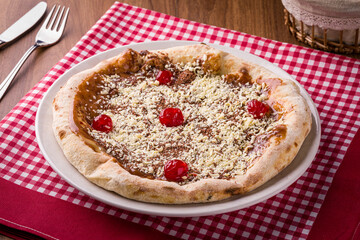 Delicious Gourmet Dessert Pizza with Chocolate and Cherries