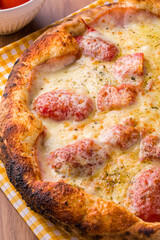 Delicious Homemade Italian Pizza with Melted Cheese and Tomato Toppings