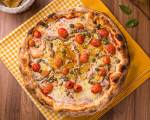 Delicious Italian Pizza With Cherry Tomatoes and Anchovies