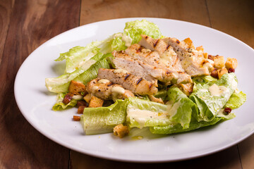 Delicious Grilled Chicken Caesar Salad on Plate