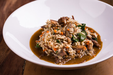 Delicious Bowl of Rice with Vegetables and Tender Meat