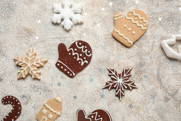 Composition with different Christmas cookies and decorations on grunge background