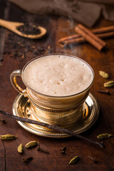 Elegant Cup of Spiced Chai Tea with Aromatic Ingredients