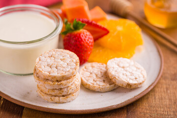 Healthy Breakfast Plate with Rice Cakes and Fresh Fruits