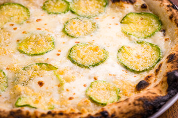 Close-Up of Zucchini and Cheese Topped Gourmet Pizza