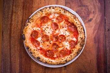 Delicious Pepperoni Pizza on Rustic Wooden Table