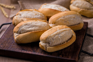 Freshly Baked Bread Rolls on Rustic Wooden Board