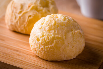 Delicious Homemade Brazilian Cheese Bread on Wooden Surface