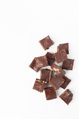 Top View of Homemade Chocolate Pecan Fudge on a White Background