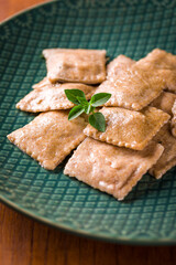 Delicious Fresh Ravioli Served on a Stylish Green Plate