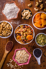 Assorted Healthy Ingredients Including Nuts, Dried Fruits, and Grains