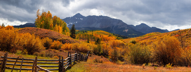 San Juan mountains farm landscape panoramic view in autumn time.