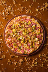 Gourmet Pizza With Toppings on Rustic Wooden Platter