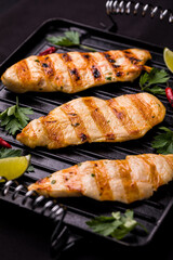 Grilled Chicken Breasts on a Hot Iron Grill Pan