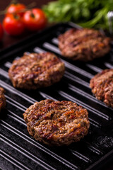 Juicy Beef Patties Grilling on Barbecue Grill